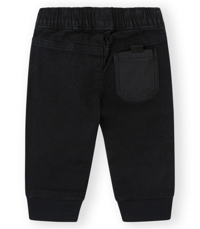 Pantalón bebé niño oscuro con gomas. Modelo Road
