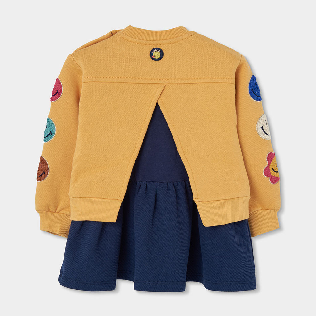 Vestido felpa amarillo con parches de emoticonos