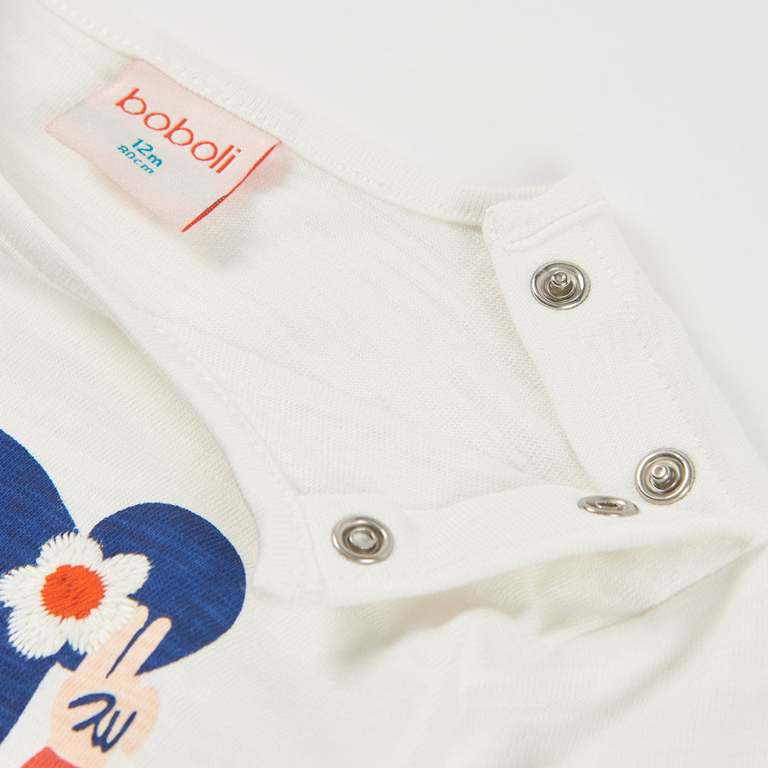 Camiseta punto niña blanca estampado muñeca con gafas