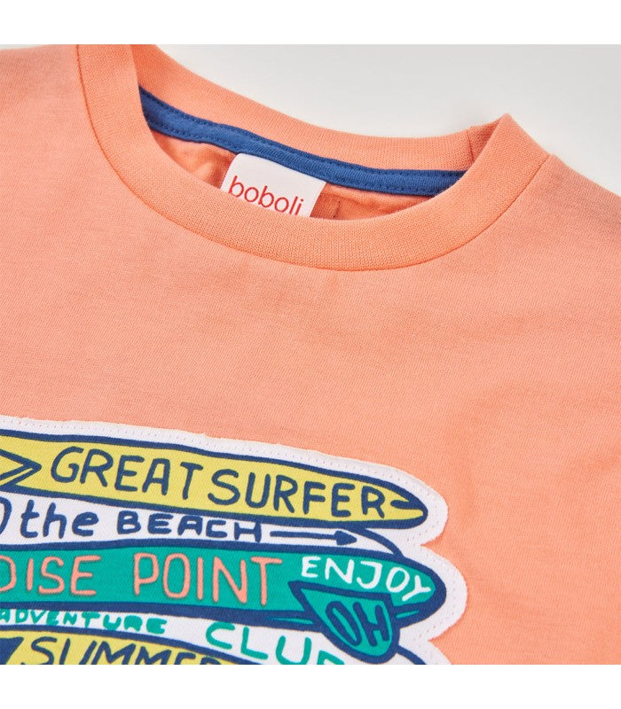 Camiseta niño naranja estampada