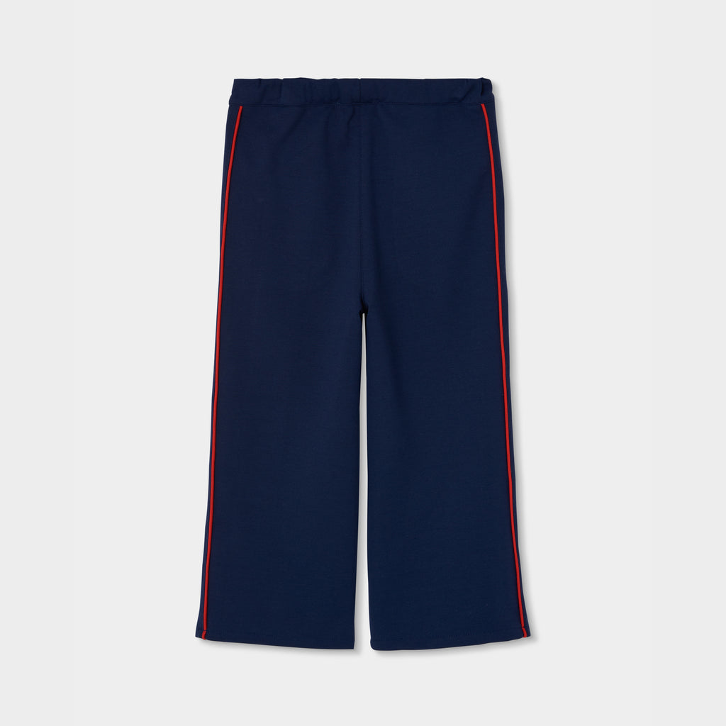 Pantalón niña azul marino con franja roja lateral wide leg