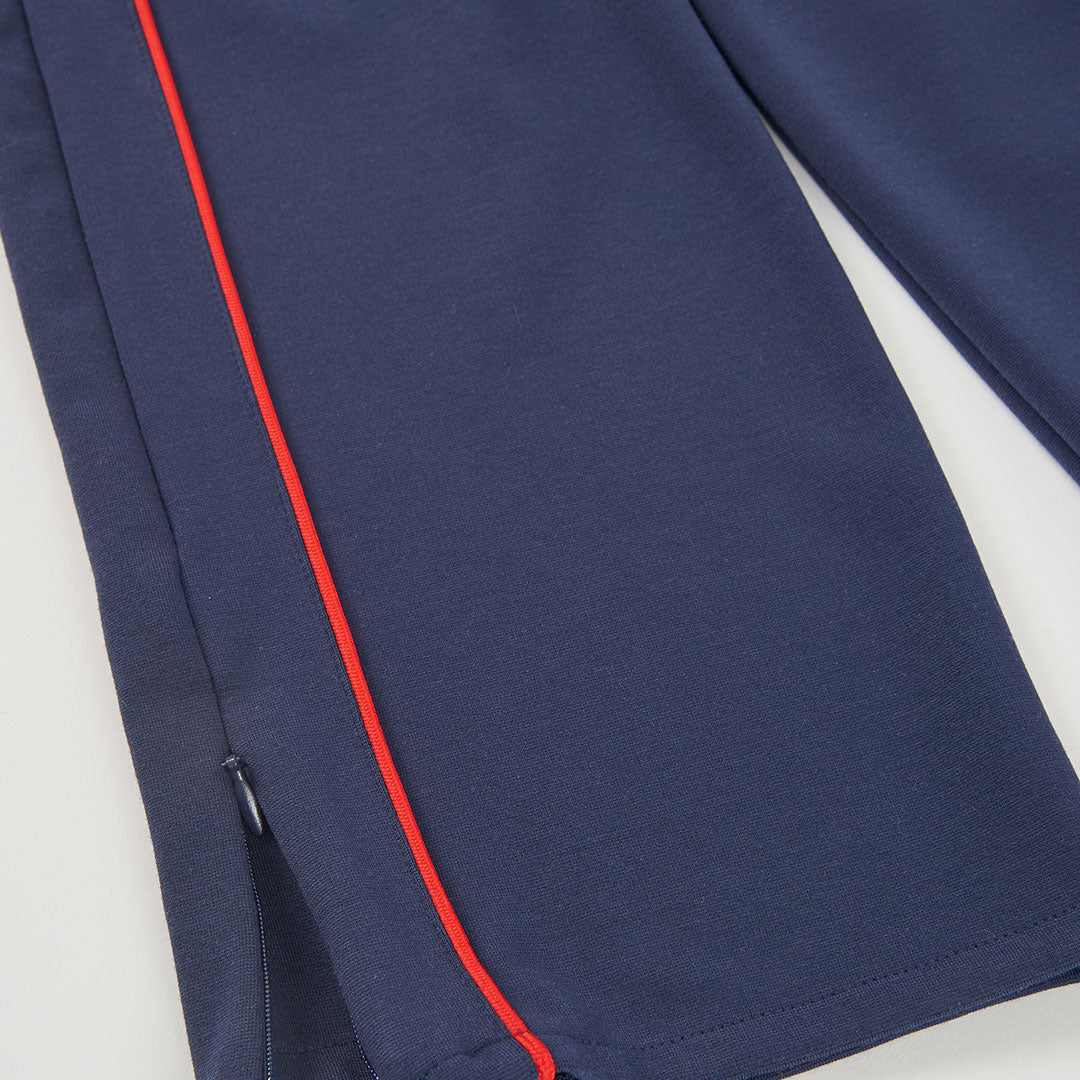 Pantalón niña azul marino con franja roja lateral wide leg
