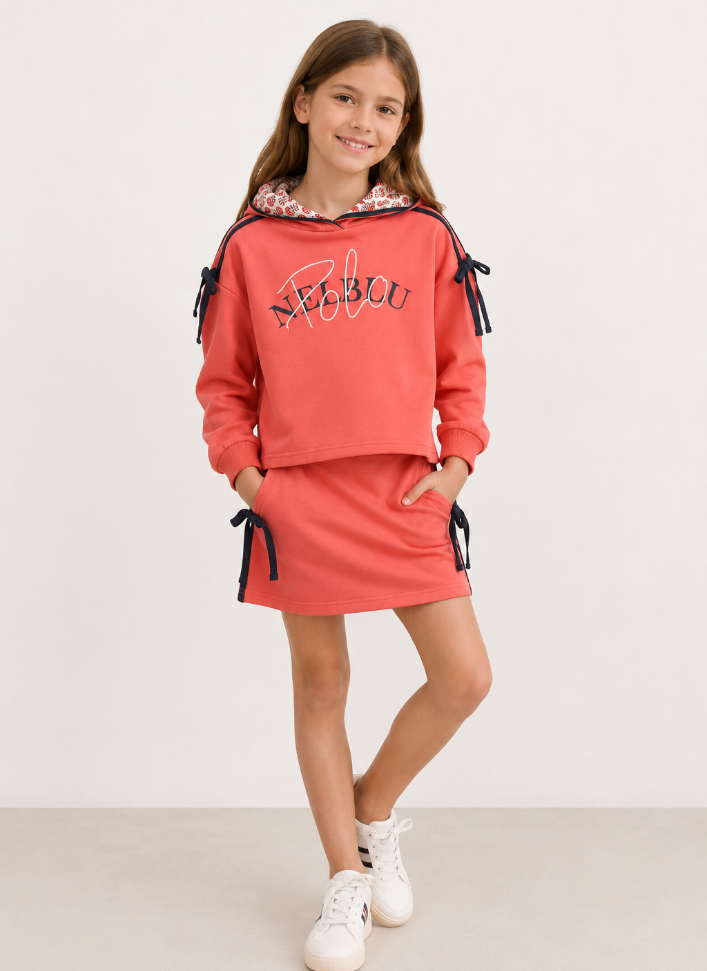 Conjunto de sudadera y falda para niña